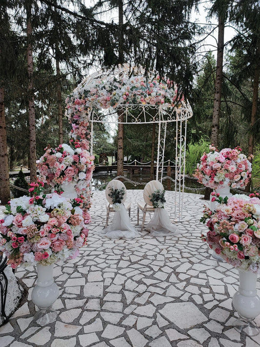 a wedding set up in the middle of a park